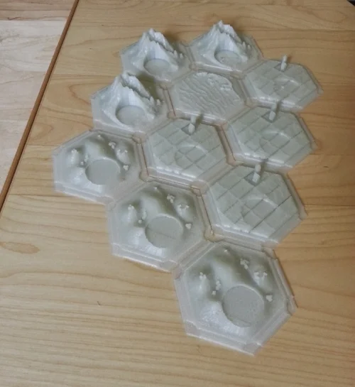 Game pieces printed in clear PLA. Design by JAWong. More printed pieces prior to priming and painting.