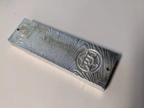 I hand carved the feed and air vent holes into the mold. Raw Casting Raw Casting