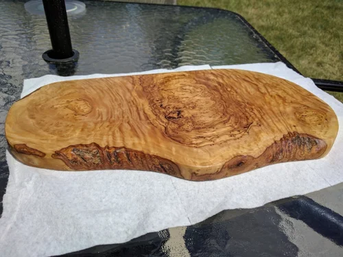 The finished challah board after finish sanding and a few coats of cutting board oil. The reverse side showing the gorgeous grain and live edge.