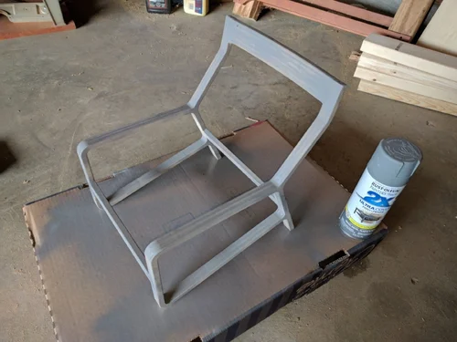 Finished and sanded chair frame. Painting the chair gray, of course the day I was painting was the coldest and rainiest day of the summer drastically slowing down the drying between coats.