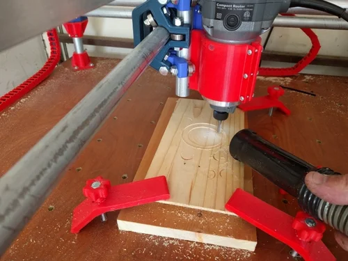 CNC installed in it's final home, a corner of the garage. First cut First cut