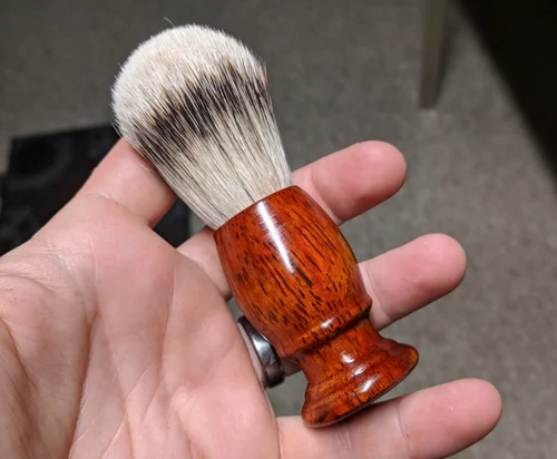 All done, the knot is glued in with two part marine epoxy. Another handle made out of beautiful African padauk.