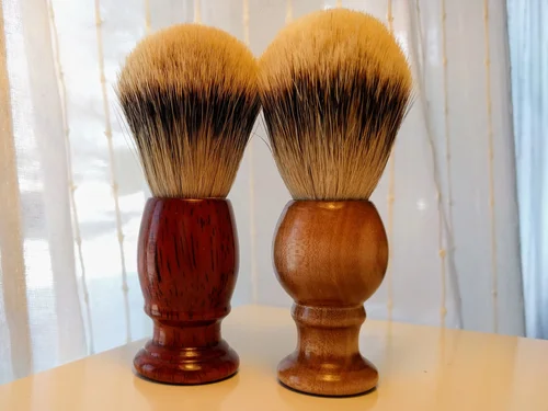 Another handle made out of beautiful African padauk. Side by side, padauk on the left, curly maple on the right.