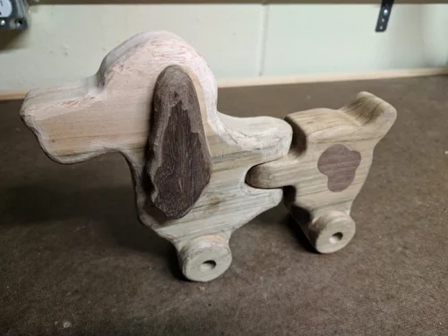 The ears and spots were inlaid with walnut. For sanding I used a dremmel with a rough sanding bit to rough in the shape then went back with 120 and 220 grit sand paper to smooth out the form.