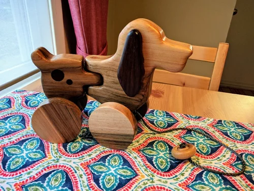 The wheels are from the same board of maple.  The rear wheels have little inscriptions that will only be visible from the inside. All ready to be played with!